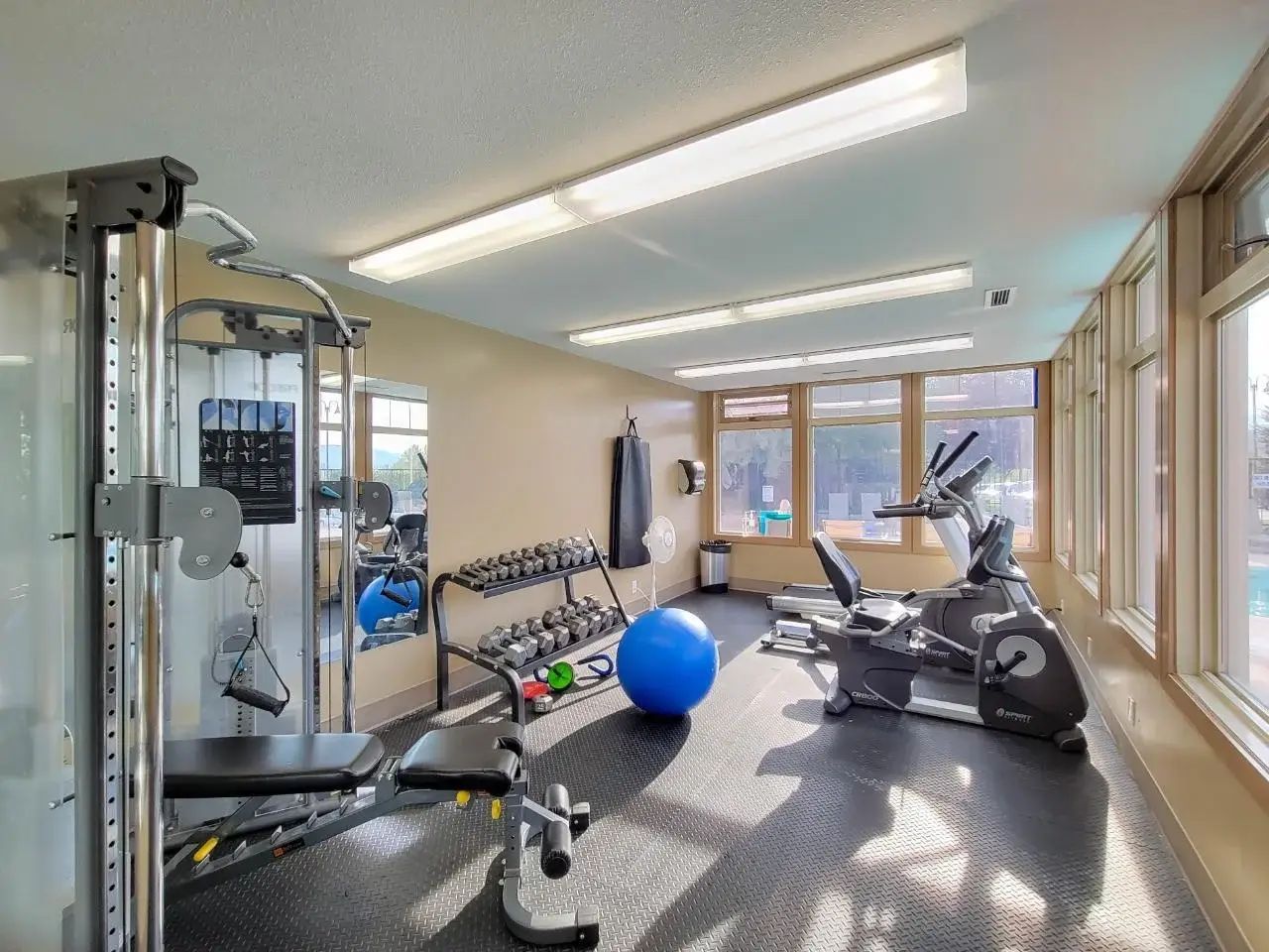 Full gym fitness centre of the Stylish condo of Lake Windermere Pointe in Invermere, a BC Vacation Rental hosted by Aisling Baile Property Management.