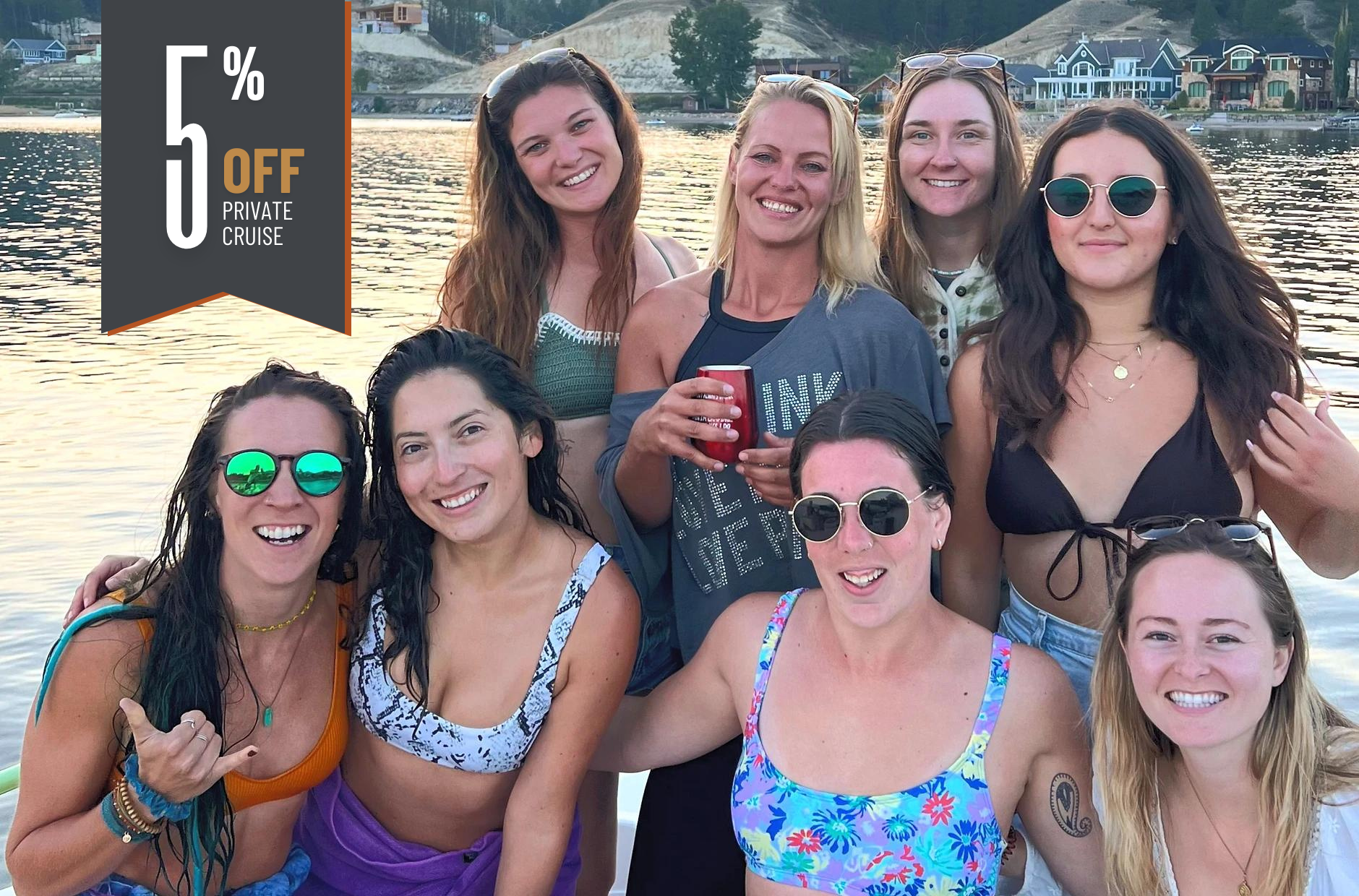 A group of women are posing for a picture on a boat.