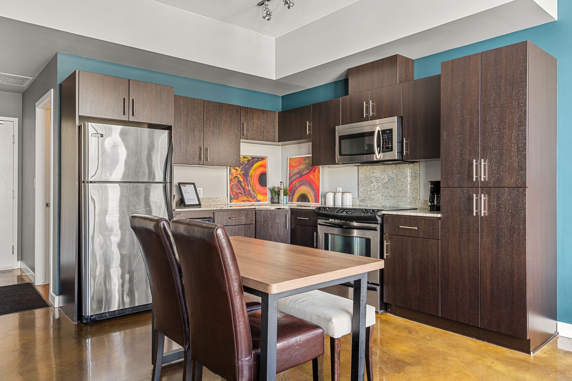 Full kitchen of All My Fave Colours a Calgary short-term rental hosted by Aisling Baile Property Management.