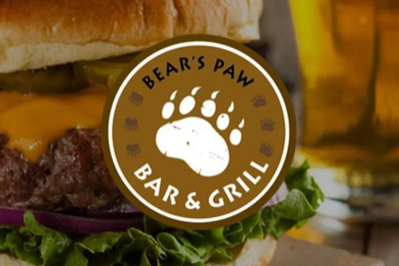 Bear’s Paw Bar & Grill logo over a burger and fries background