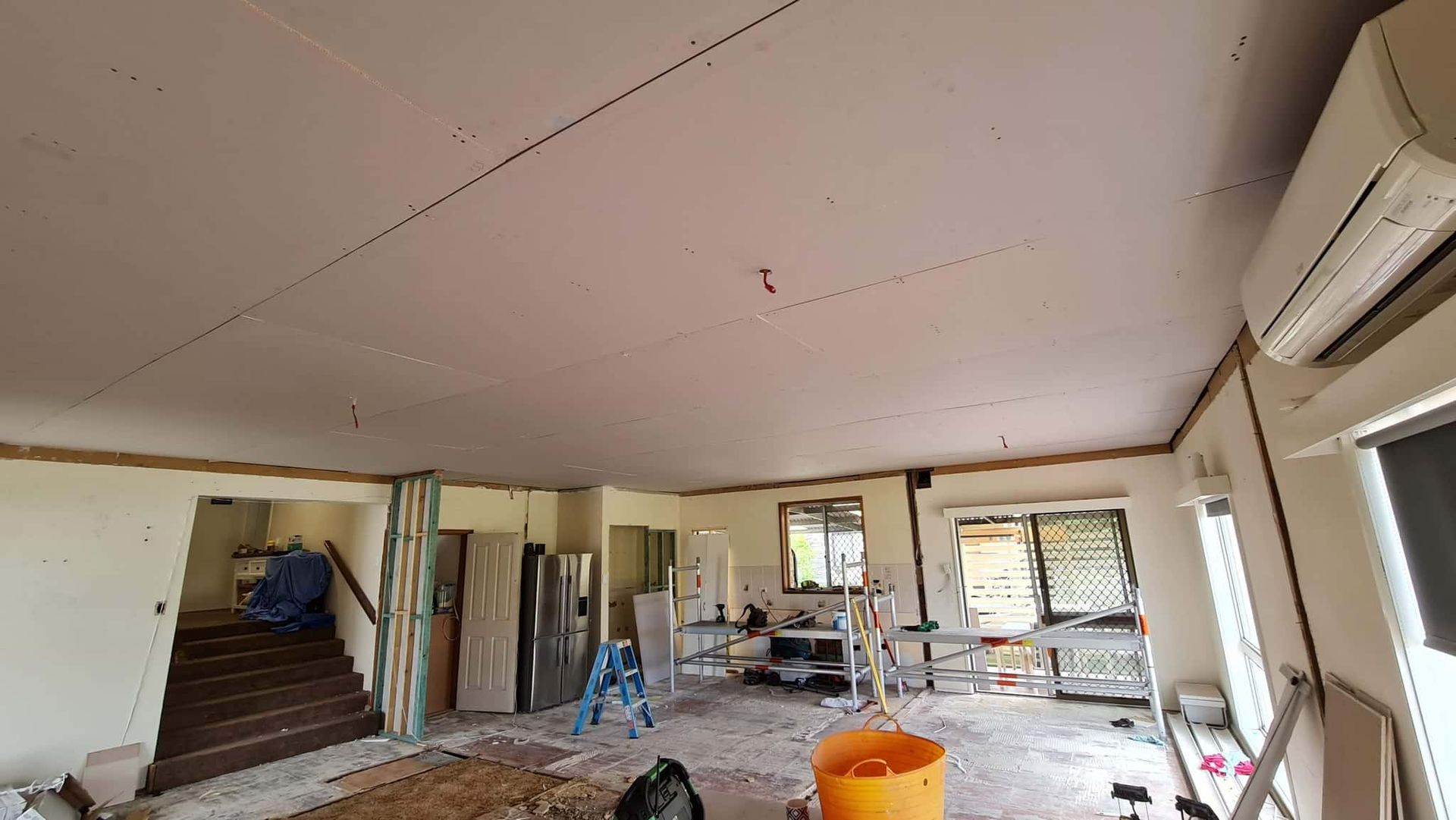 A Large Room With A Ceiling That Is Being Remodelled — Renovate A Space In Empire Bay, NSW