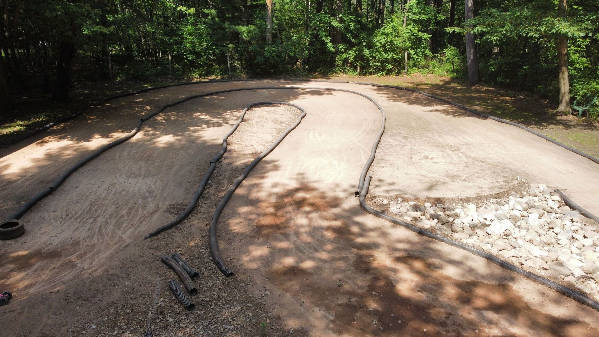 A remote control car track in the middle of a forest