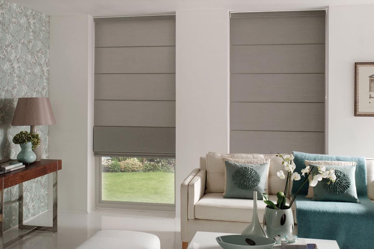 Living Room Two Windows With Roman Blinds — Maxview Blinds and Shutters in Beresfield, NSW