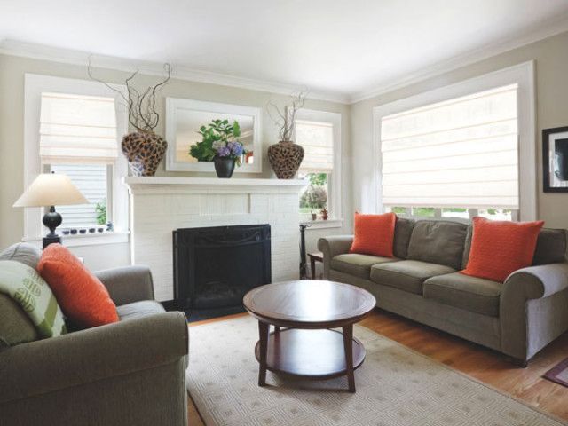 A Living Room With Two Couches And Window Roman Blinds — Maxview Blinds and Shutters in Beresfield, NSW