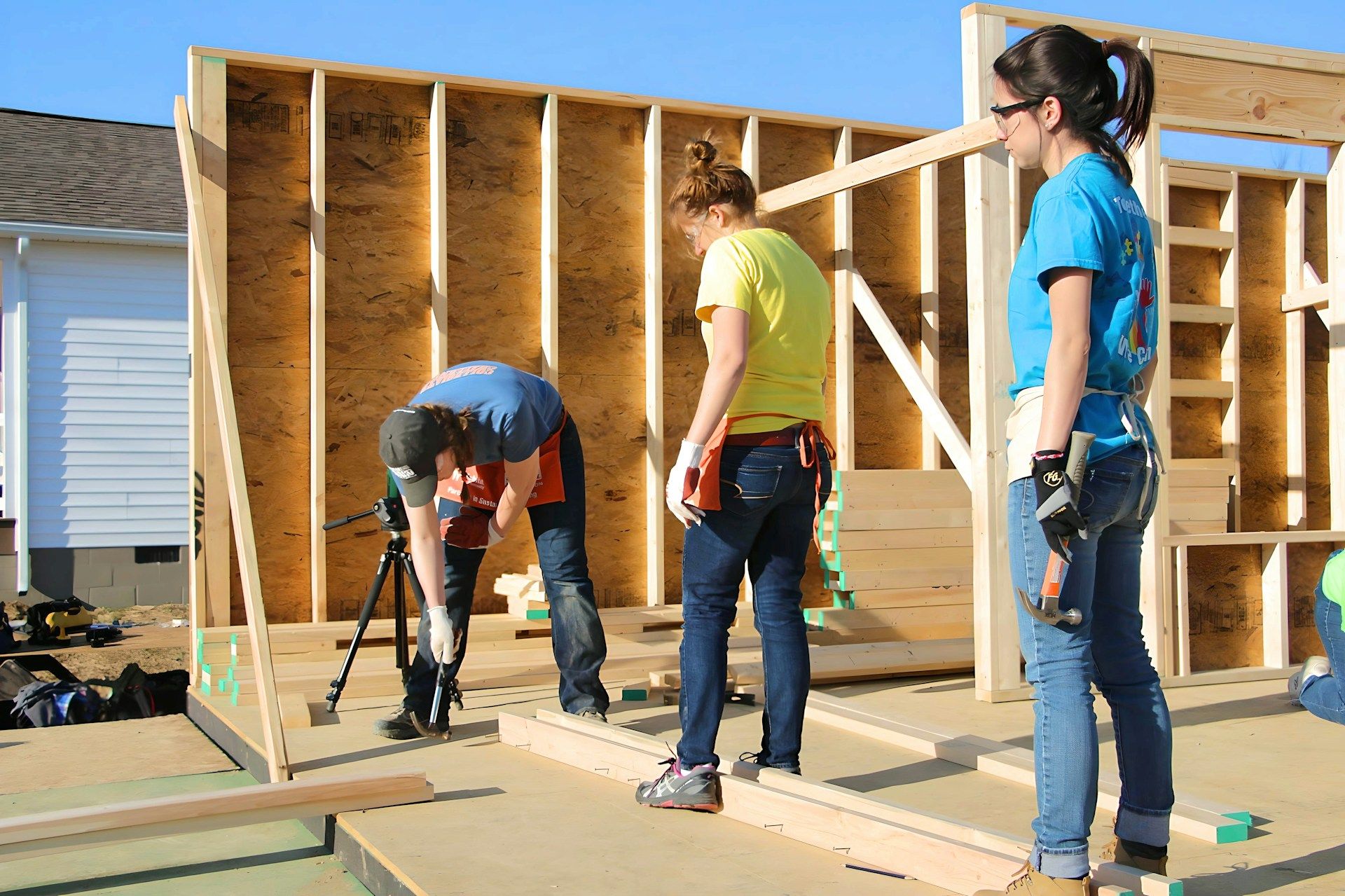 group of people working on wooden floor