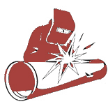 A man is welding a pipe with a welding mask on.