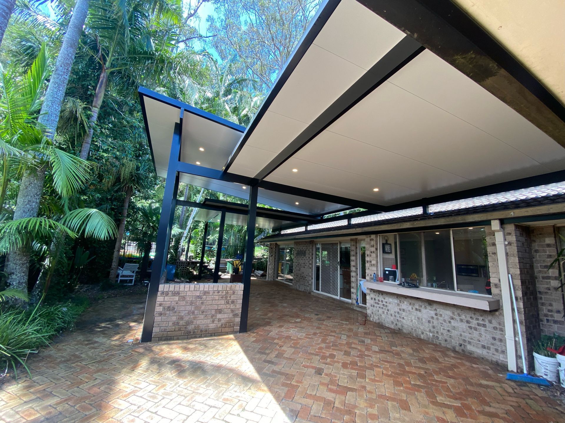 Trendy Outdoor Patio Pergola Shade Structure — Designs & Installs Custom Roofs in Central Coast, NSW