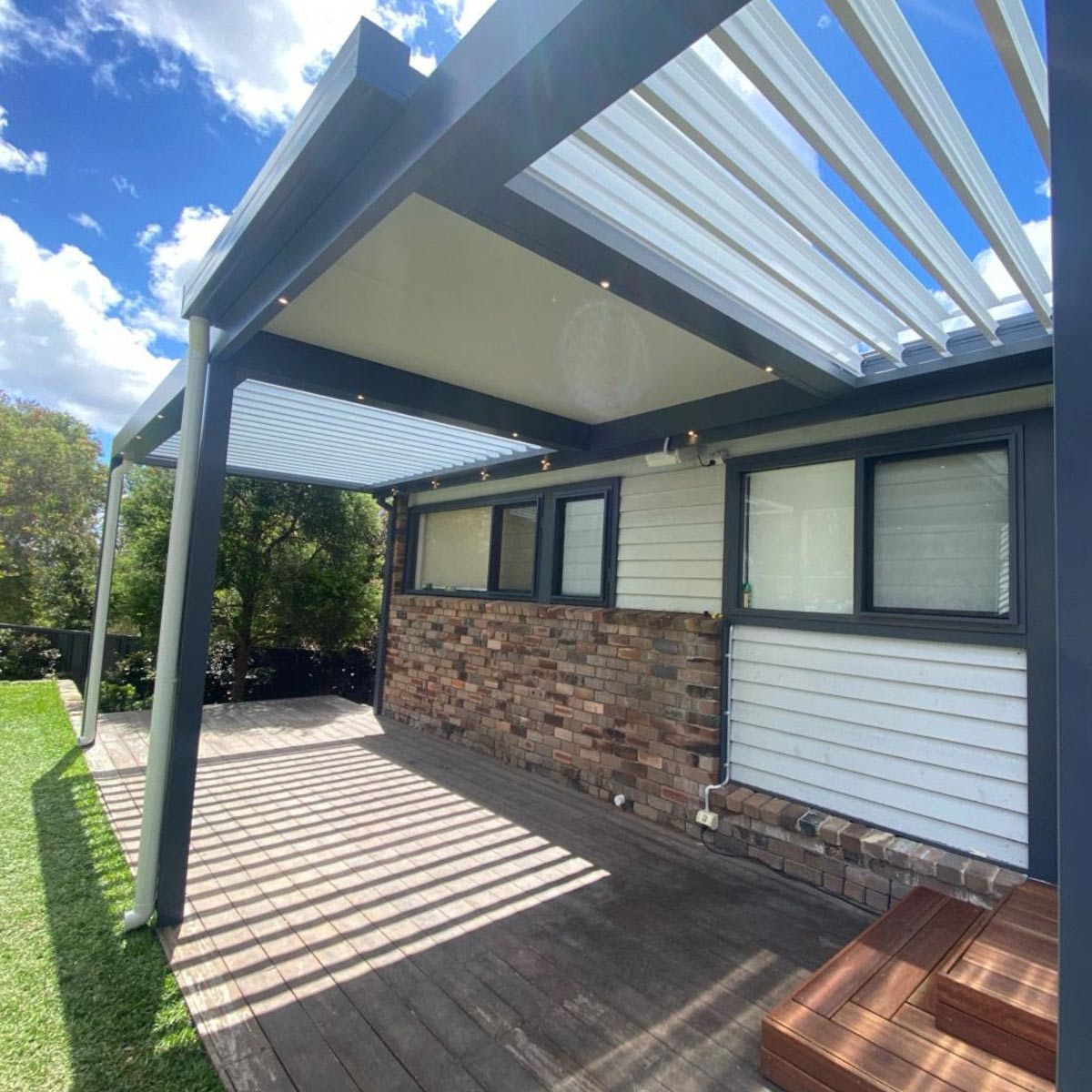 Side Patio Roofing with Louvres — Patio Roof Installation in Tuggerah, NSW
