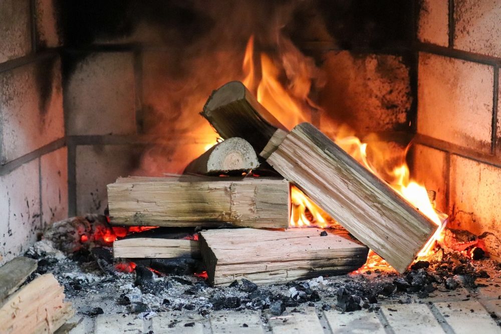 Bright Flames Burn Through Stacked Wooden Logs — Complete Heating In Huntingfield, TAS