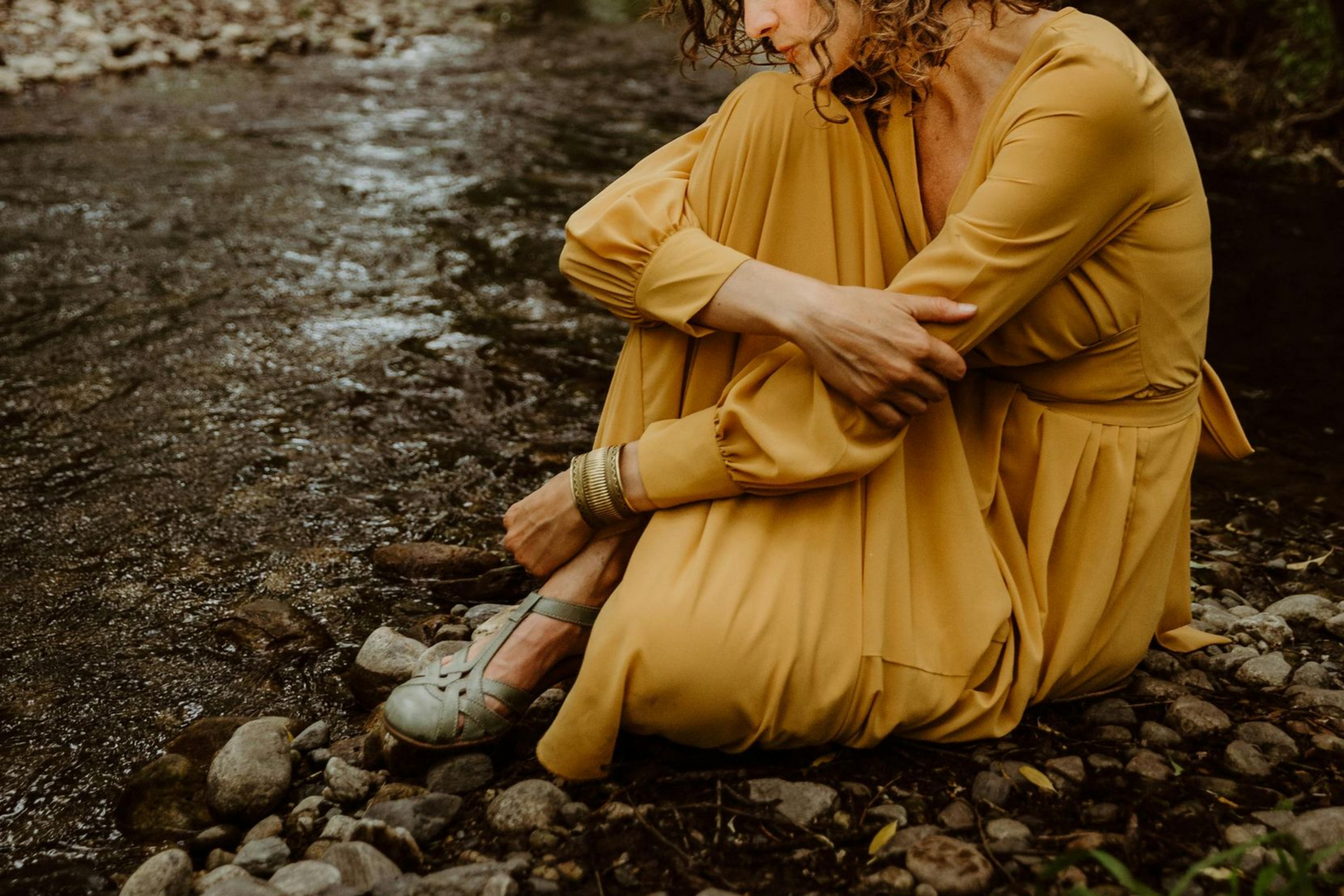 woman sitting on ground