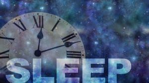 A clock with roman numerals is surrounded by the word sleep.