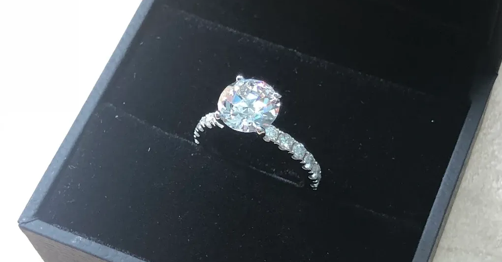 Diamond ring in a black jewelry box