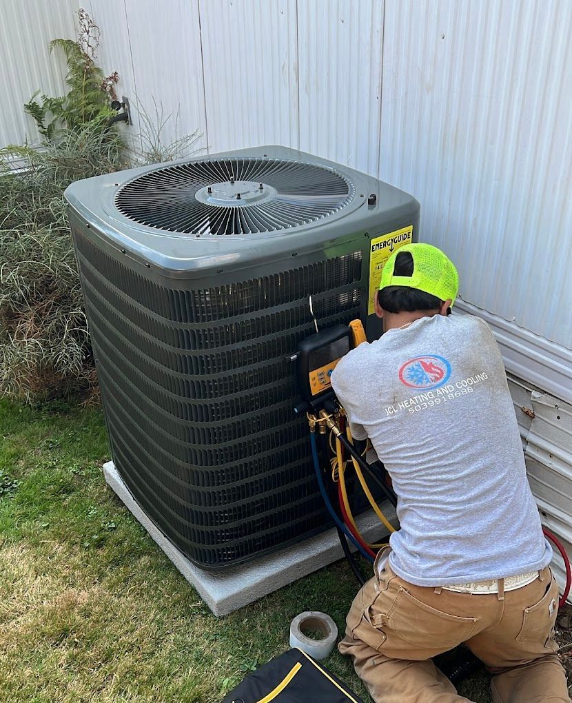 a man is working on an air conditioner in a backyard .