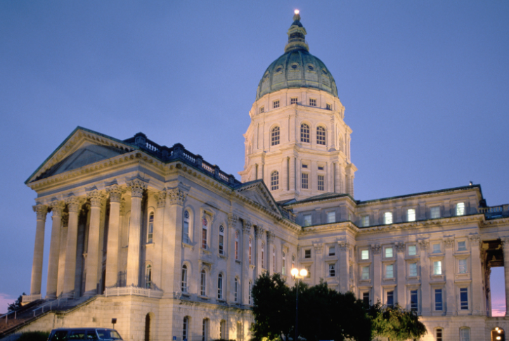Kansas State Capitol building at dusk in Topeka