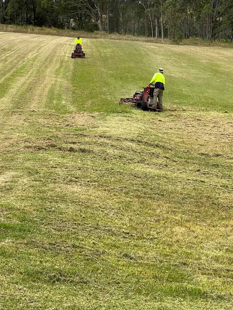 Two Man Using Lawn Mowers — Gardeners In Pokolbin, NSW