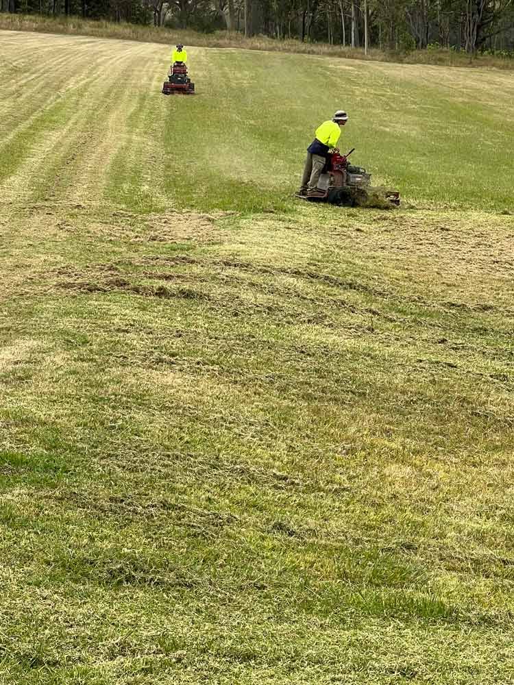 Two Men Working On The Open Field — Gardeners In Broke, NSW