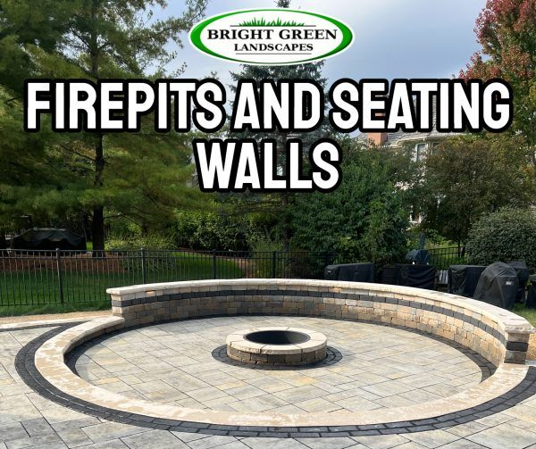 Firepit with circular seating wall; Bright Green Landscapes logo; outdoor setting.