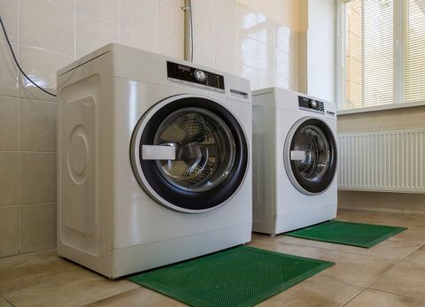 Two Washing Machines In Laundry Room — Sarasota County, FL — Amerovent Dryer Vent Cleaning Specialists