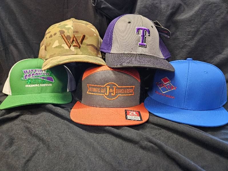 A group of hats are sitting on top of each other on a table.