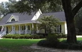 House near a tree | Spanish Fort, AL | Gafford Roofing Repair