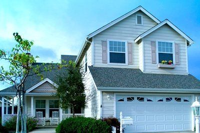 Beautiful blue house | Spanish Fort, AL | Gafford Roofing Repair