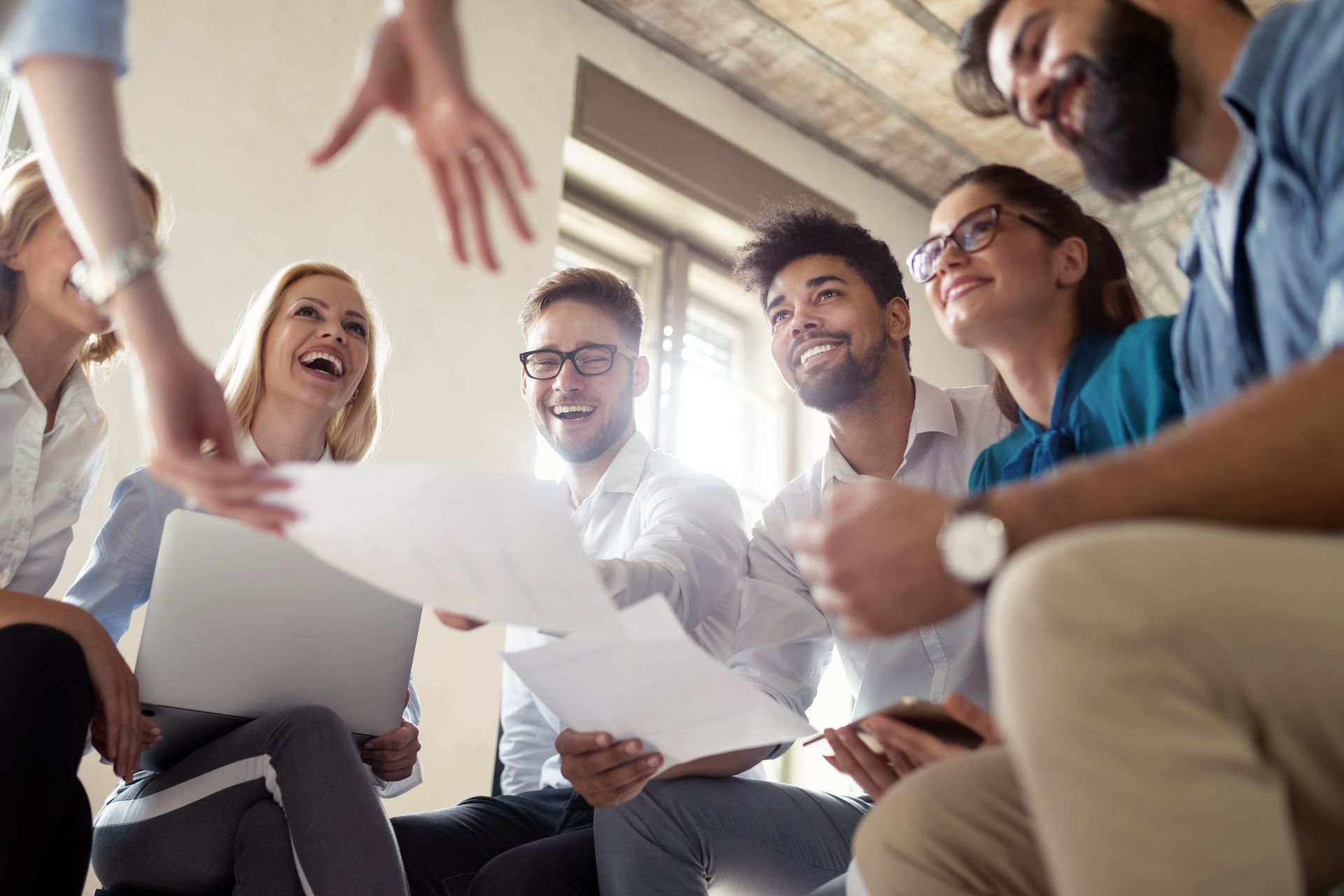 Group of diverse people laughing