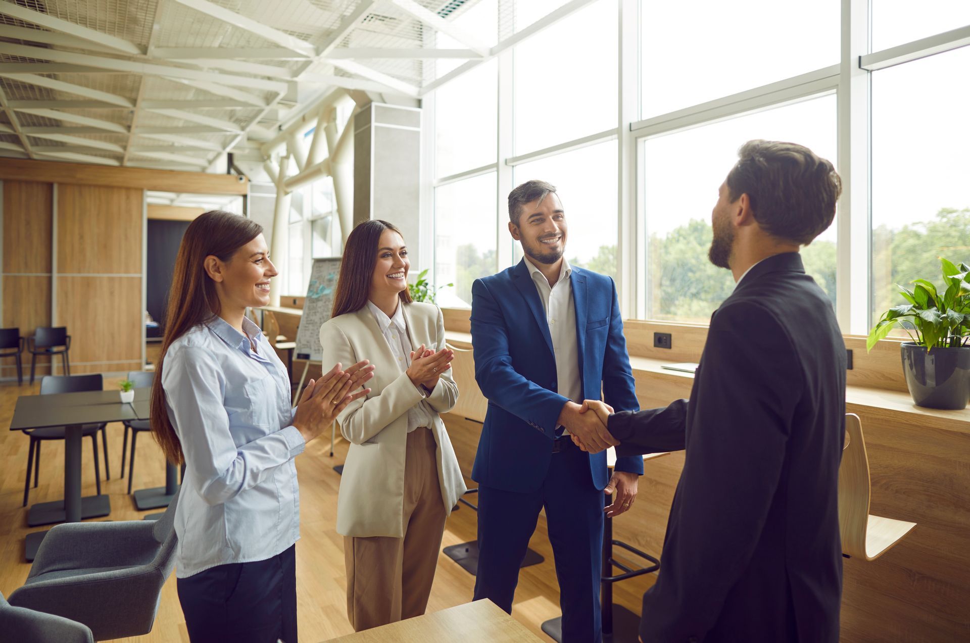 Four businesspeople in an office