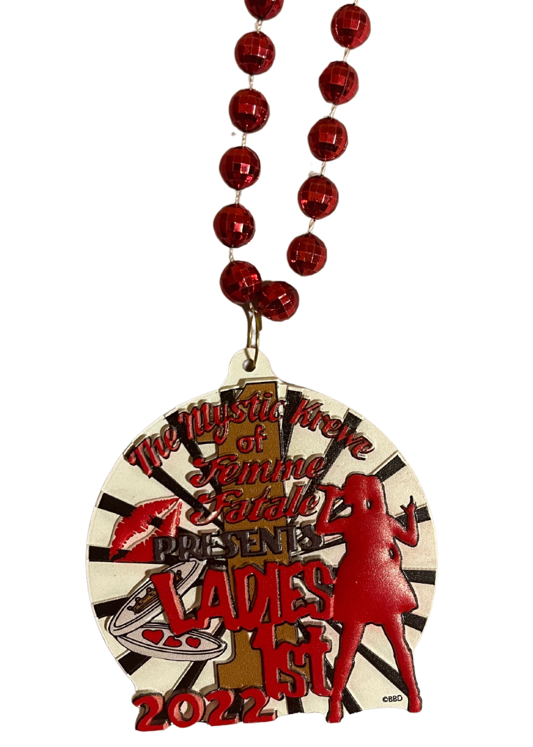 A necklace with red beads and a medal that says ladies night