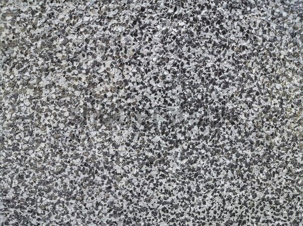 Gray granite countertop with speckled appearance.