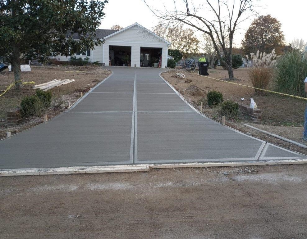 a house with concrete driveway