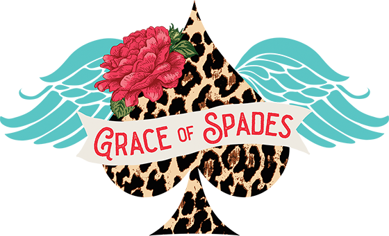 A logo for grace of spades with a leopard print ace of spades