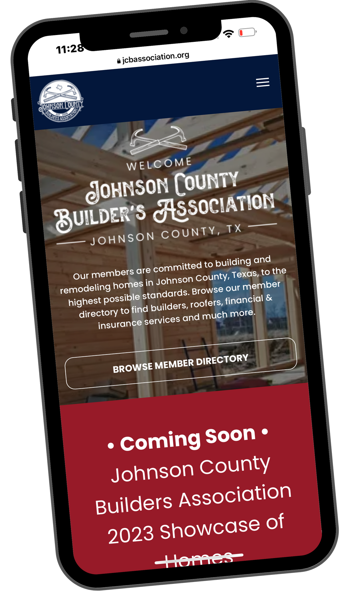 A cell phone with a johnson county builders association website on it.