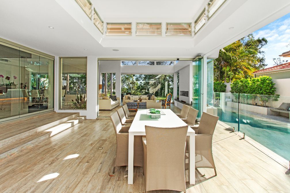 An Aerial View of a Building With a Statue on Top of It — Paul Cooper Homes In Noosa Heads, QLD