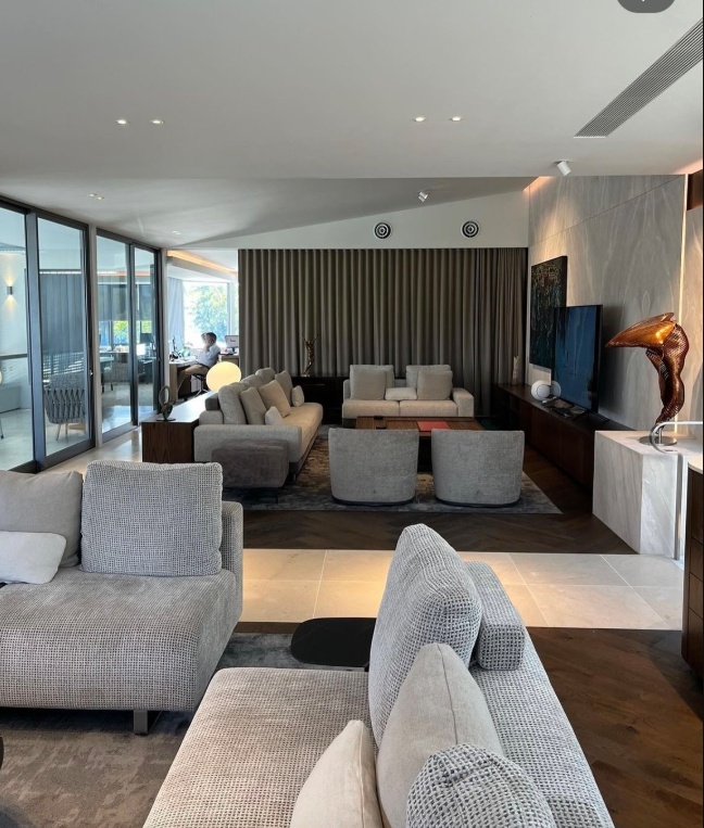 A Living Room With a Couches — Paul Cooper Homes In Noosa Heads, QLD