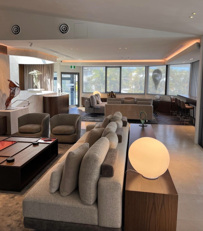 A Living Room With a Couch and Chairs in It — Paul Cooper Homes In Noosa Heads, QLD