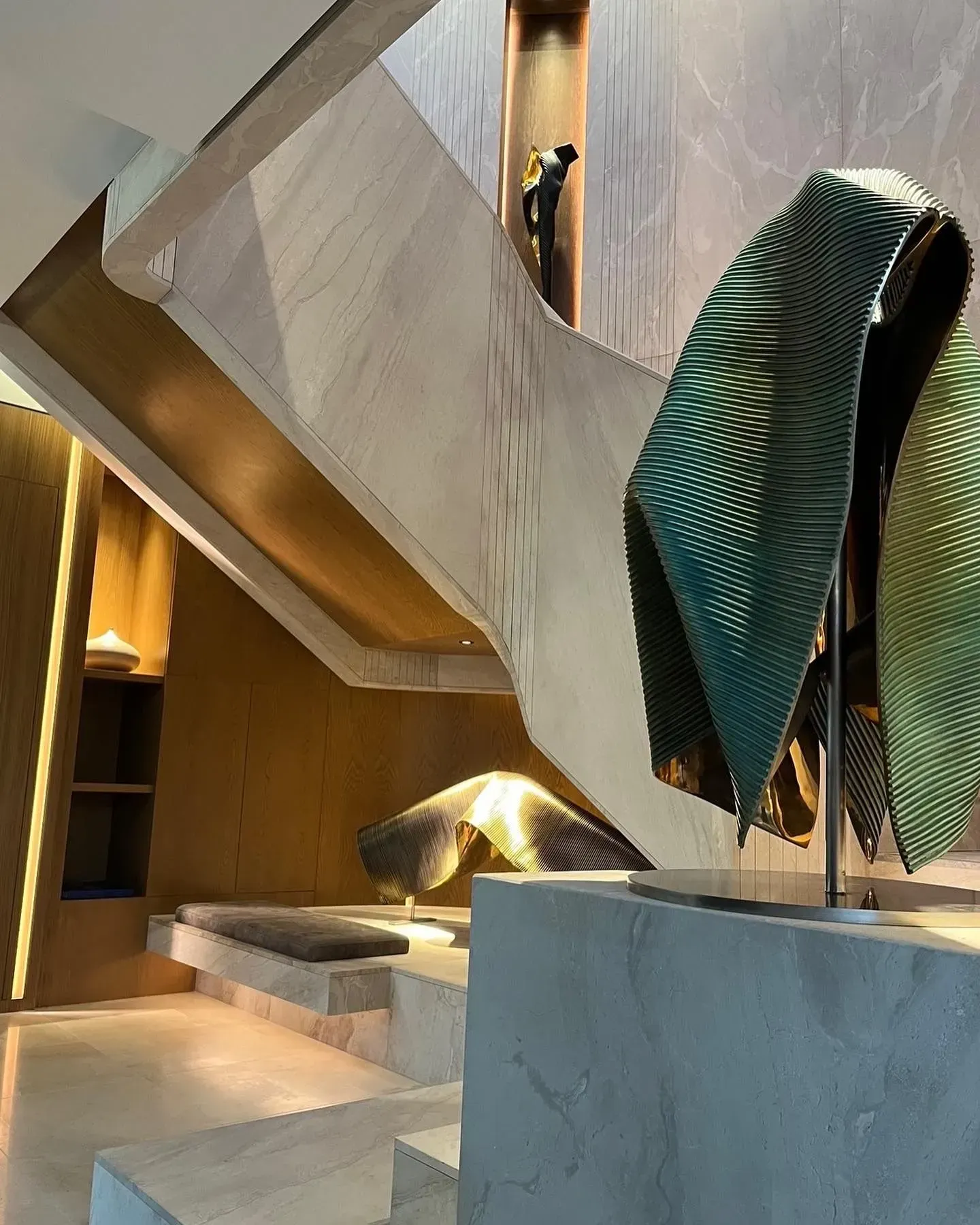 A Room With a Staircase and a Statue on a Pedestal — Paul Cooper Homes In Noosa Heads, QLD
