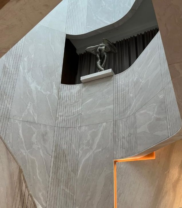 An Aerial View of a Building With a Statue on Top of It — Paul Cooper Homes In Noosa Heads, QLD