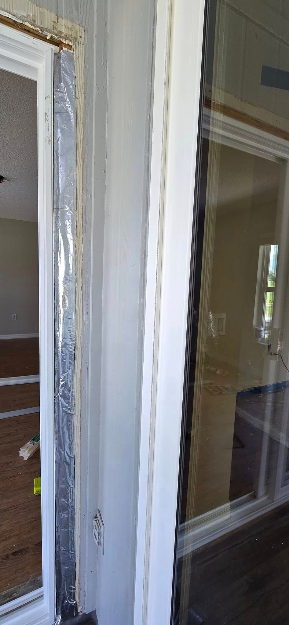 A close up of a door and window in a house.