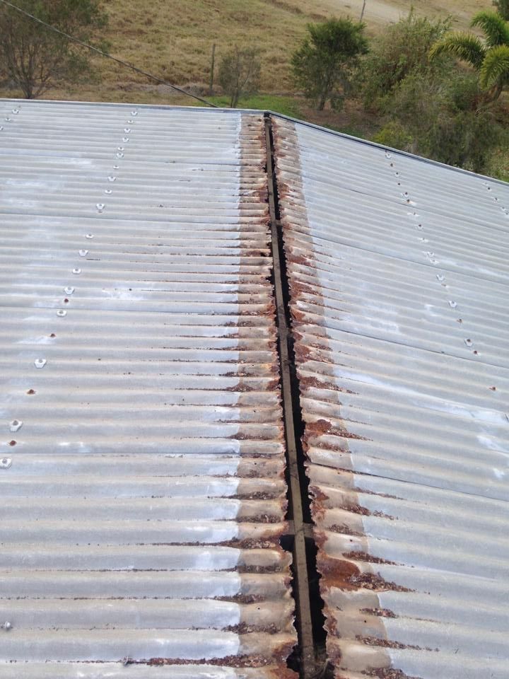 Corrugated Metal Roof Ridge With Rust; Outdoors — LJG Plumbing In Sarina, QLD