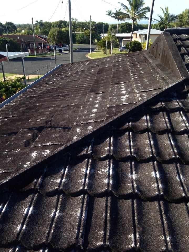 A Black Roof Tiles With White Discoloration — LJG Plumbing In Sarina, QLD