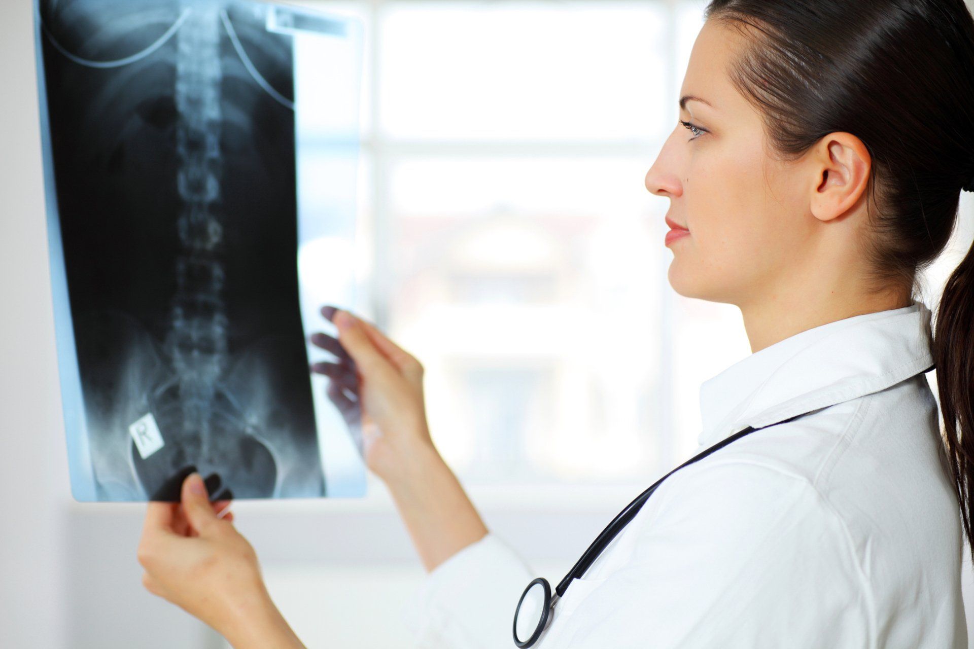 Daughters Upside Down Outside — Winchester, KY — Miller Chiropractic Centre Inc PSC Daughters Upside Down Outside — Winchester, KY — Miller Chiropractic Centre Inc PSC