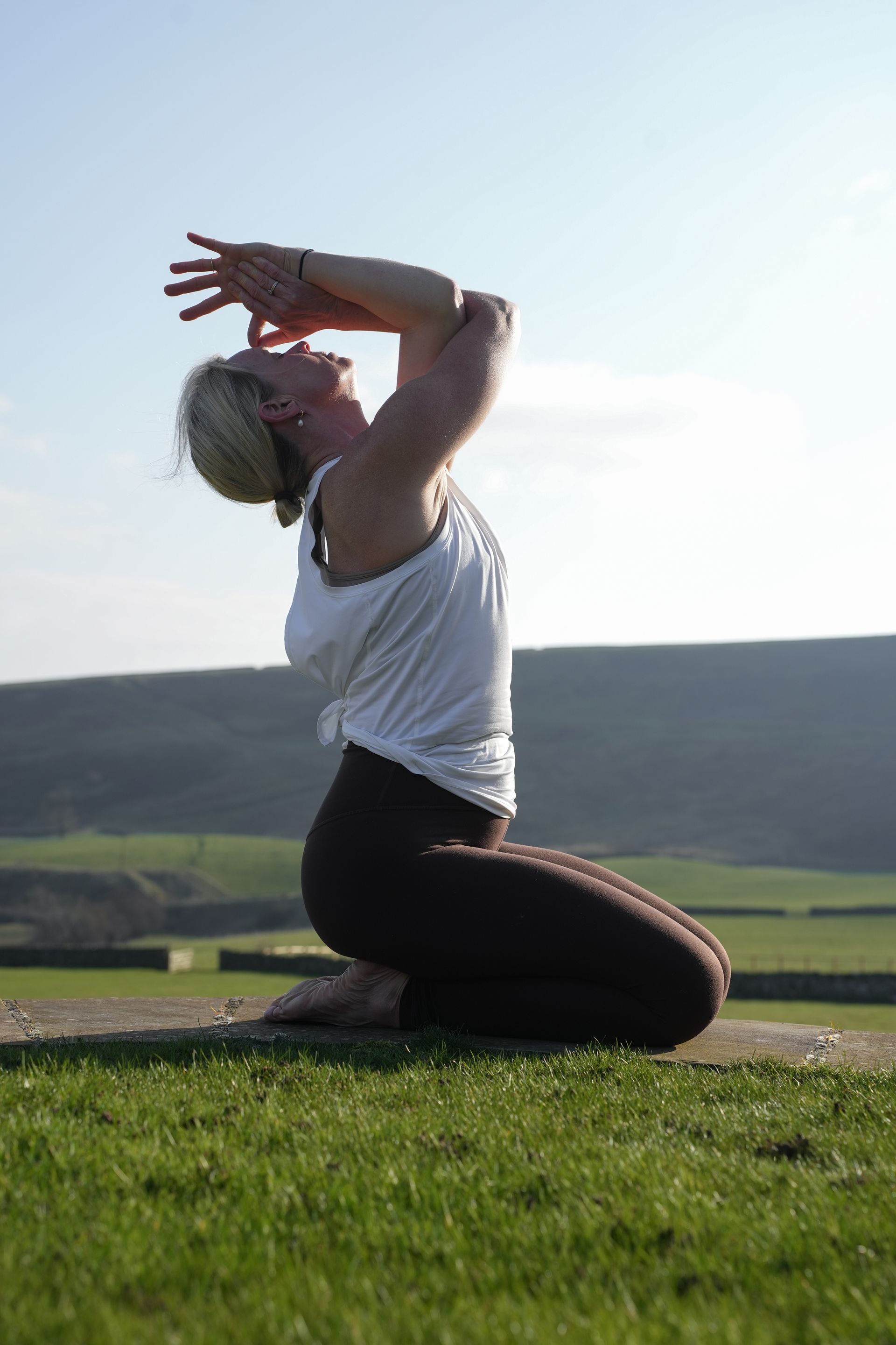 A lady doing yoga outside in Yorkshire