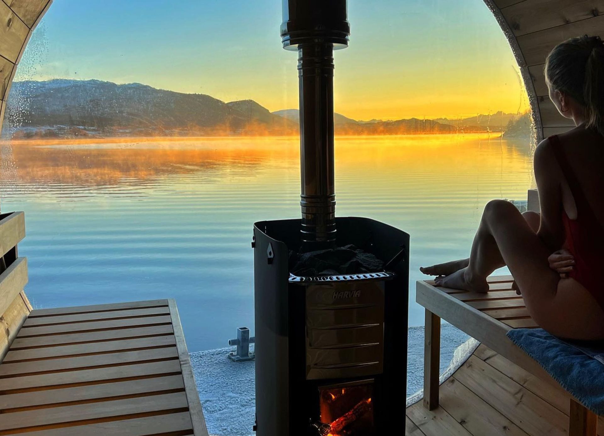 Sauna with view and woman sitting