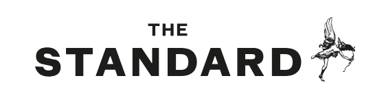 A black and white logo for the standard magazine