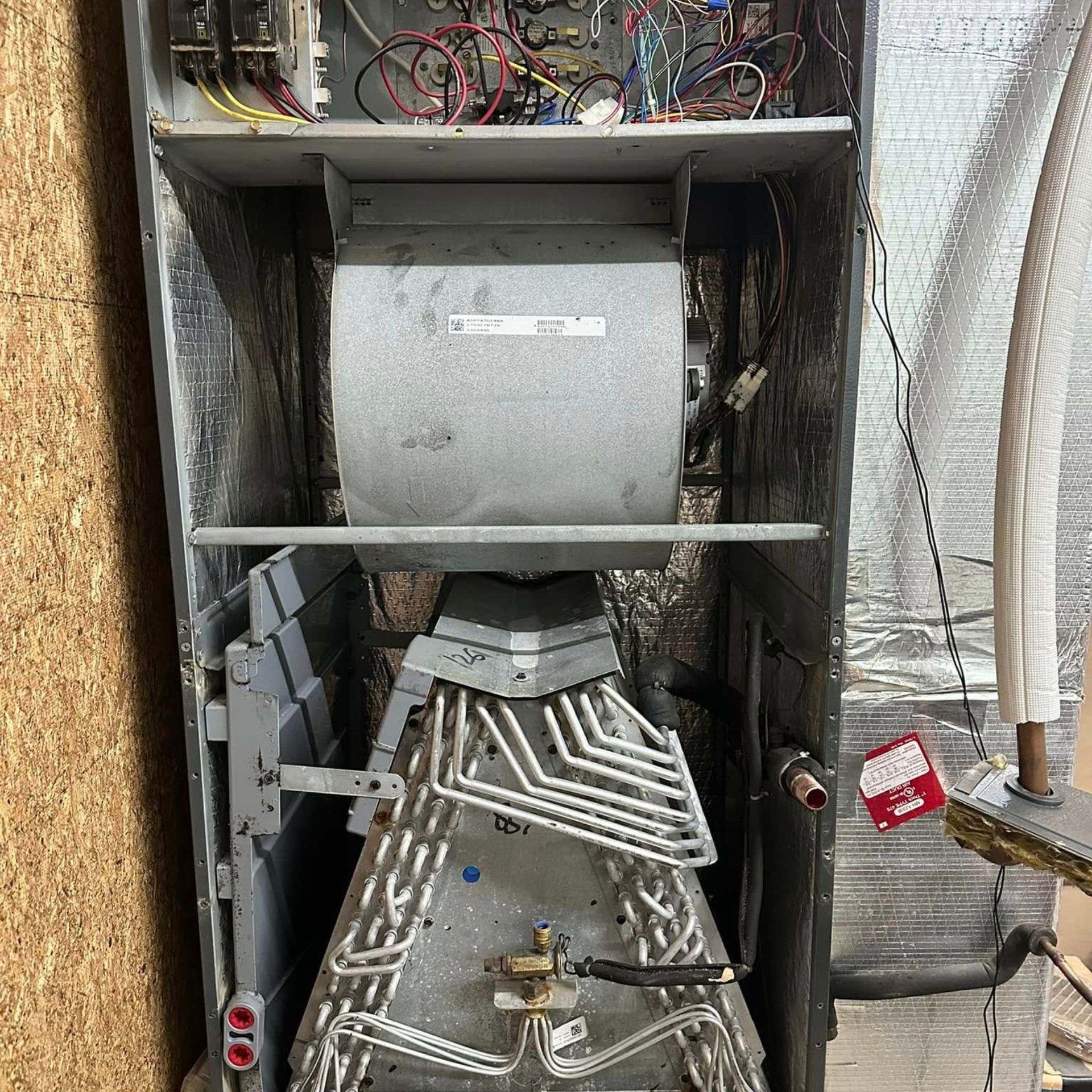 The inside of a heating and cooling system is shown.