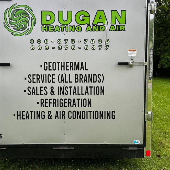 The back of a trailer advertising dugan heating and air