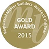 Gold Award from Registered Master Builders House of the Year 2015, golden seal with "MJ" logo.