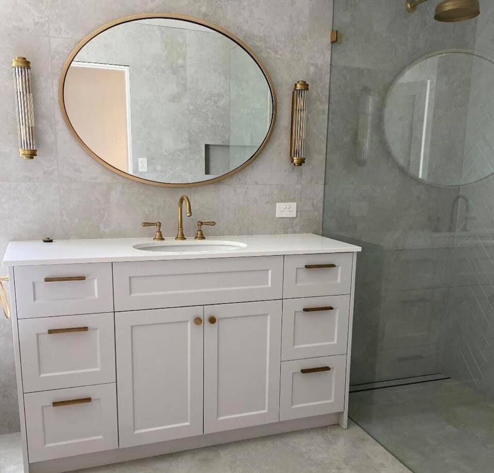A Bathroom With Two Sinks and a Large Mirror — Kenross Kitchens In Erina, NSW