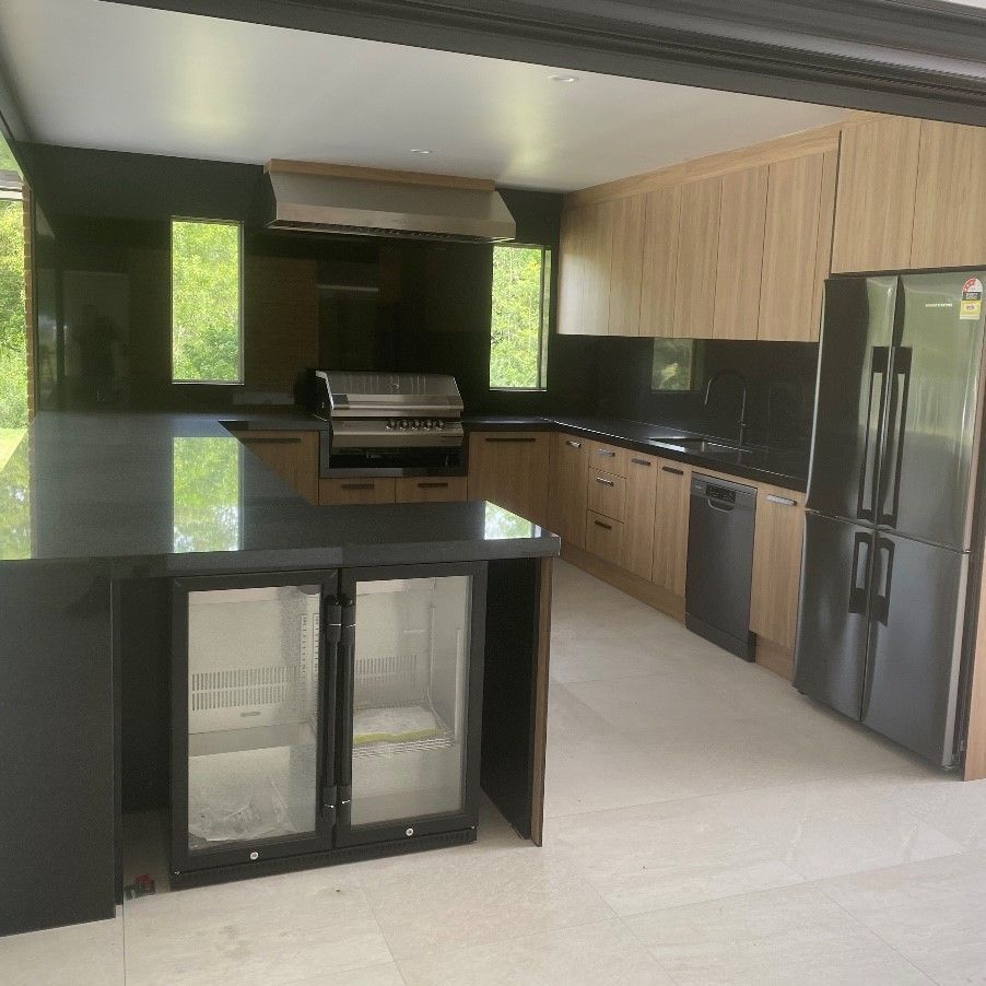 A white stone Kitchen Benchtop — Kenross Kitchens In Erina, NSW