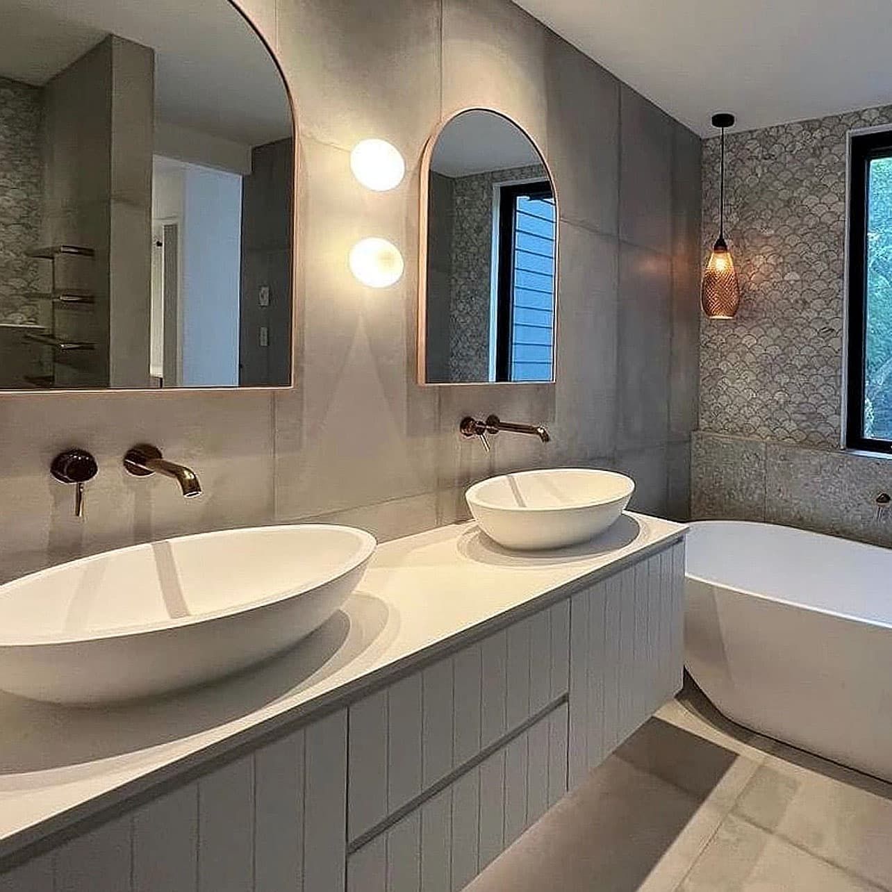 A Bathroom With Two Sinks and a Bathtub — Kenross Kitchens In Erina, NSW